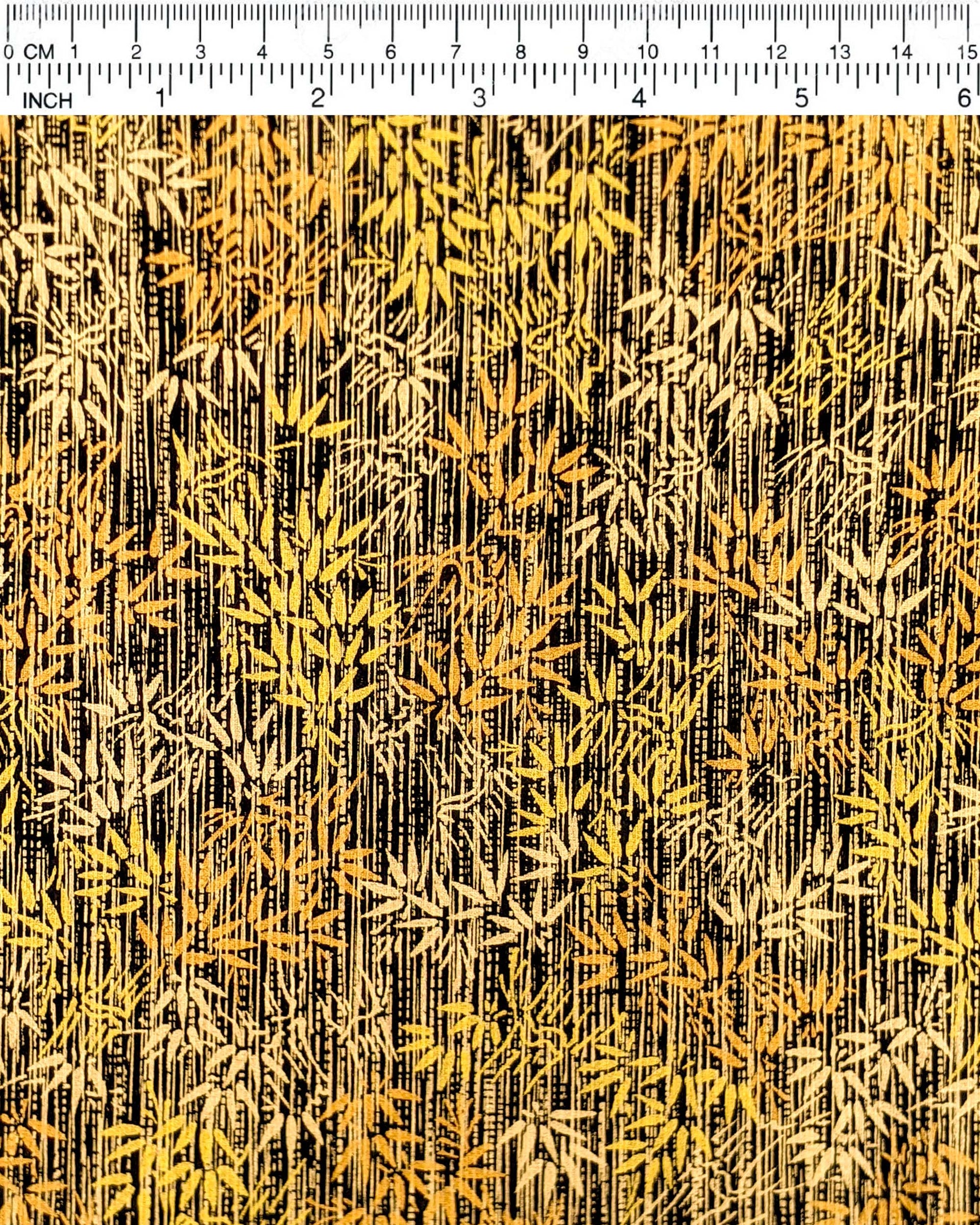 Japanese chiyogami paper featuring metallic gold and copper bamboo shoots on a black background.