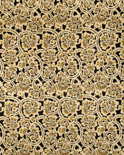 Japanese chiyogami paper featuring a large metallic gold swirl motif on a black background.