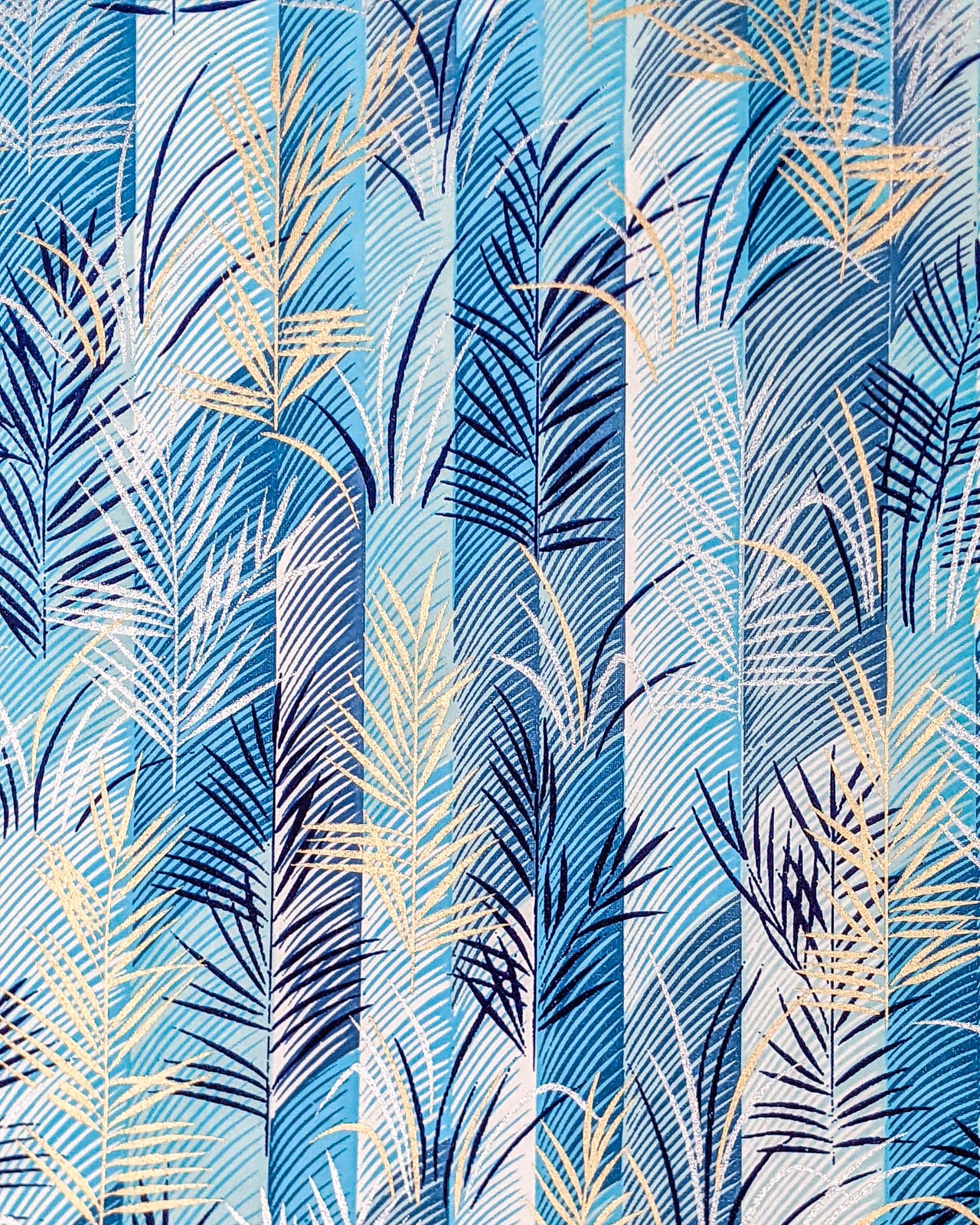 Japanese chiyogami paper featuring metallic gold and silver leaves on a cerulean blue background.