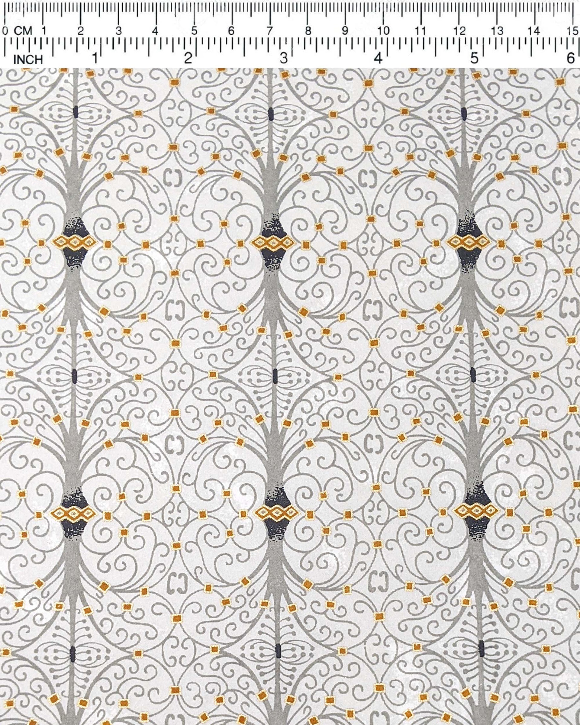 Japanese chiyogami paper featuring a gray wrought iron design on a light gray background with metallic gold details.