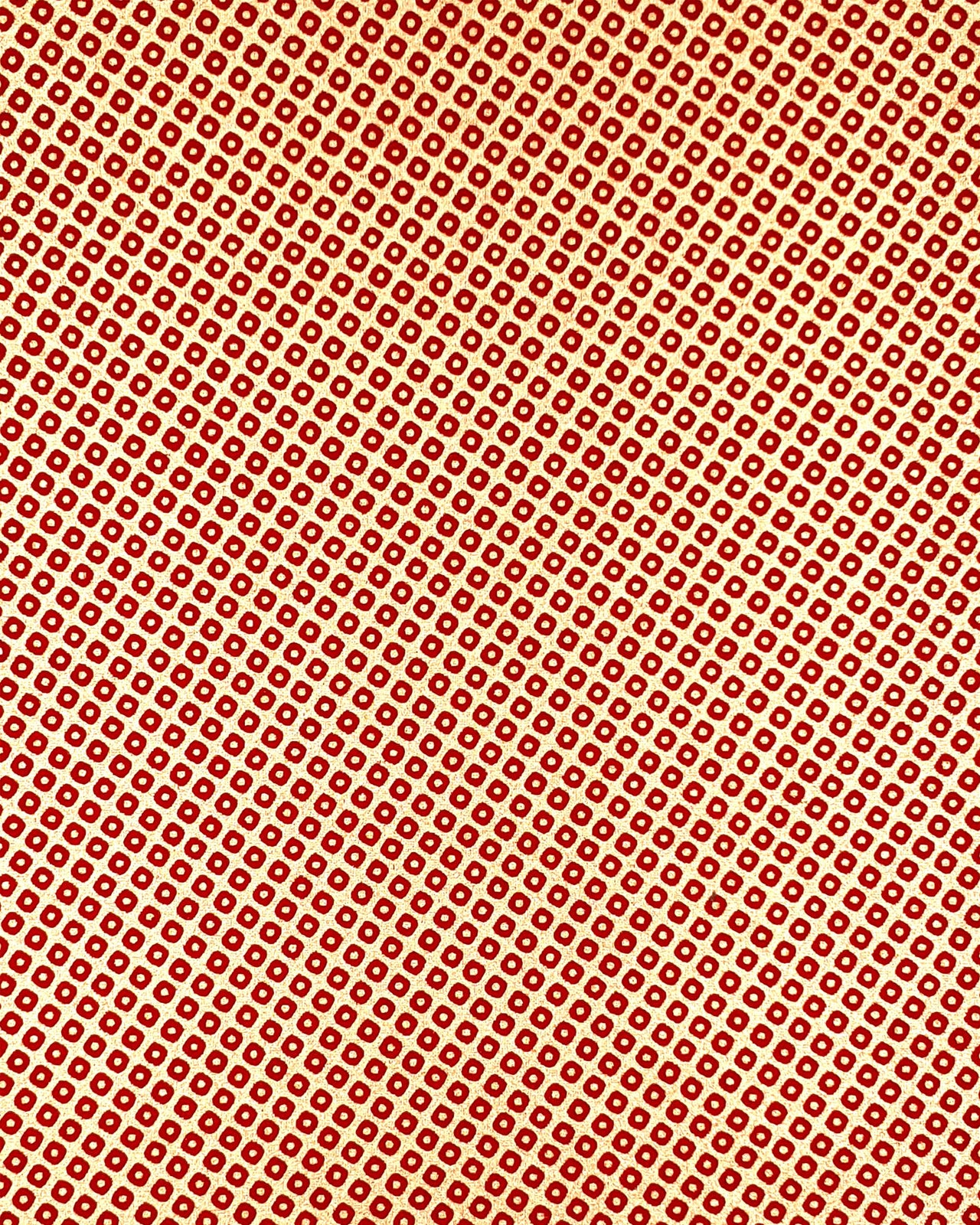 Japanese chiyogami paper featuring a traditional metallic gold and red kanoko design. 
