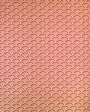 Japanese chiyogami paper featuring a traditional red and metallic gold seigaiha (wave crests) pattern.