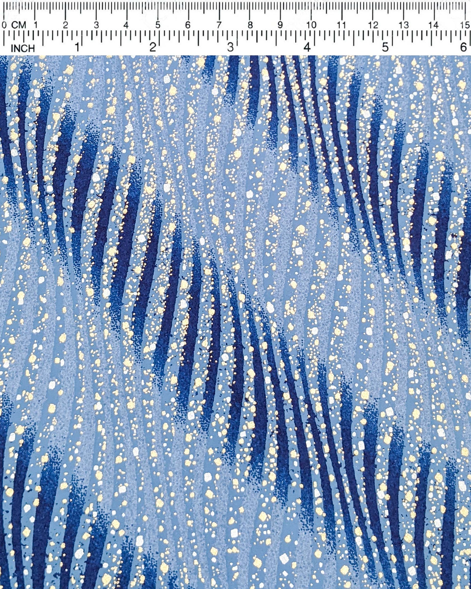 Japanese chiyogami paper featuring blue swirls with metallic gold and silver details.