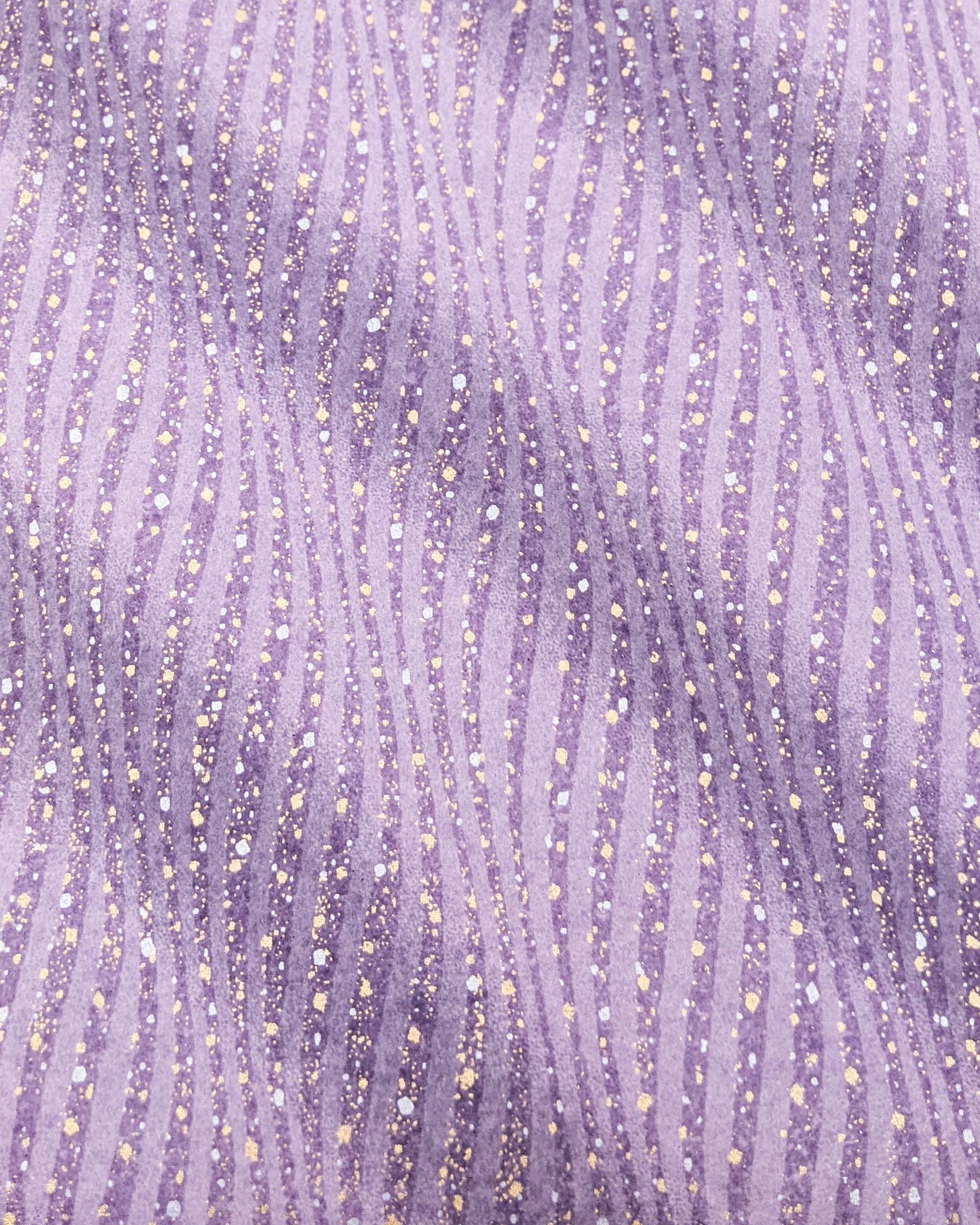 Japanese chiyogami paper featuring purple swirls with metallic gold and silver details.