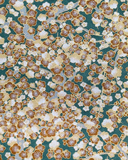Japanese chiyogami paper featuring brown and white plum blossom trees with gray branches on a green background with metallic gold details.