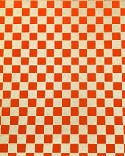 Japanese chiyogami paper featuring a traditional orange and metallic gold ichimatsu (checker) pattern.