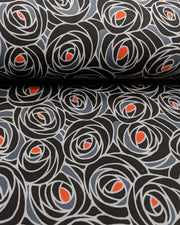 Japanese chiyogami paper featuring black and gray roses with a red center.