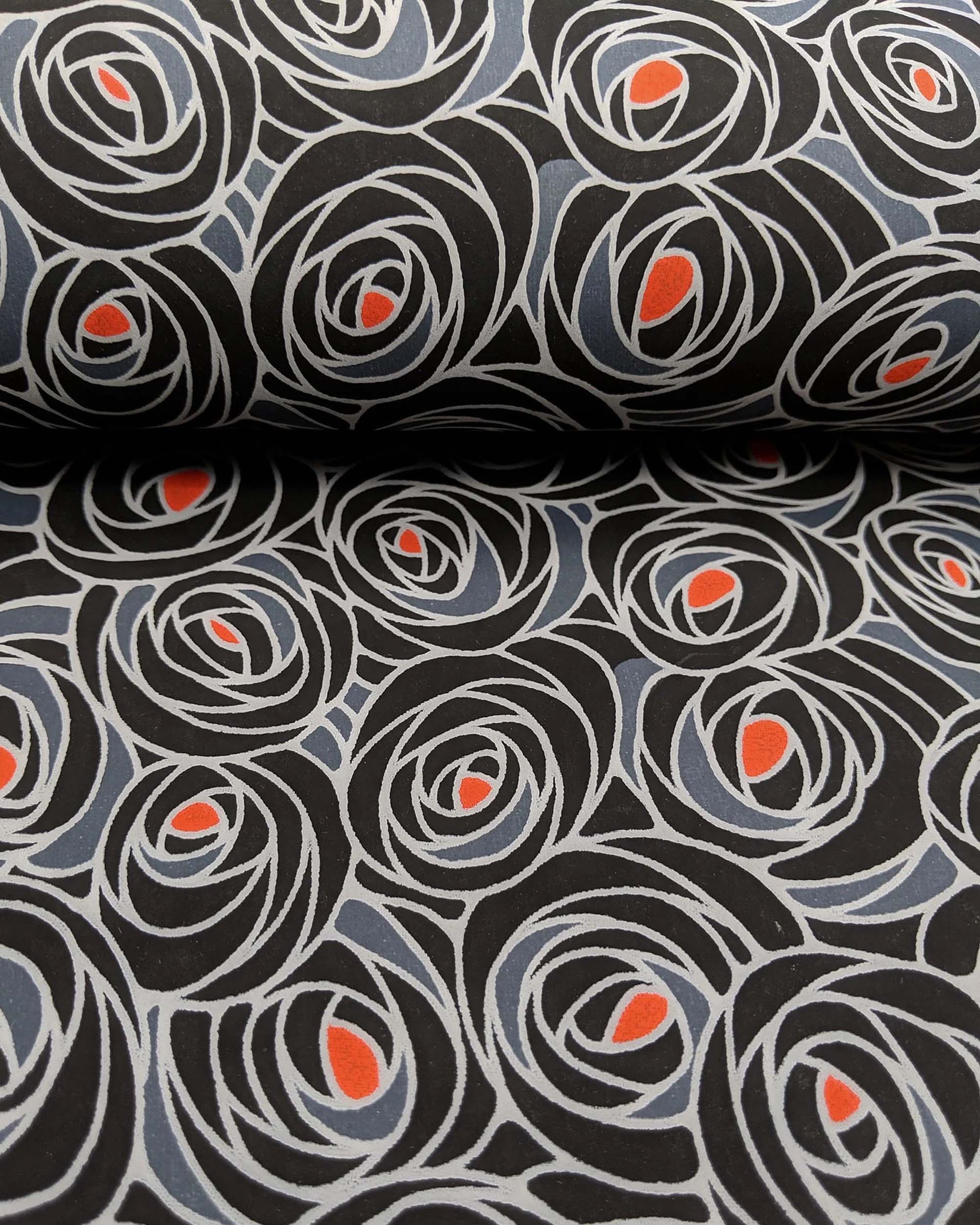 Japanese chiyogami paper featuring black and gray roses with a red center.