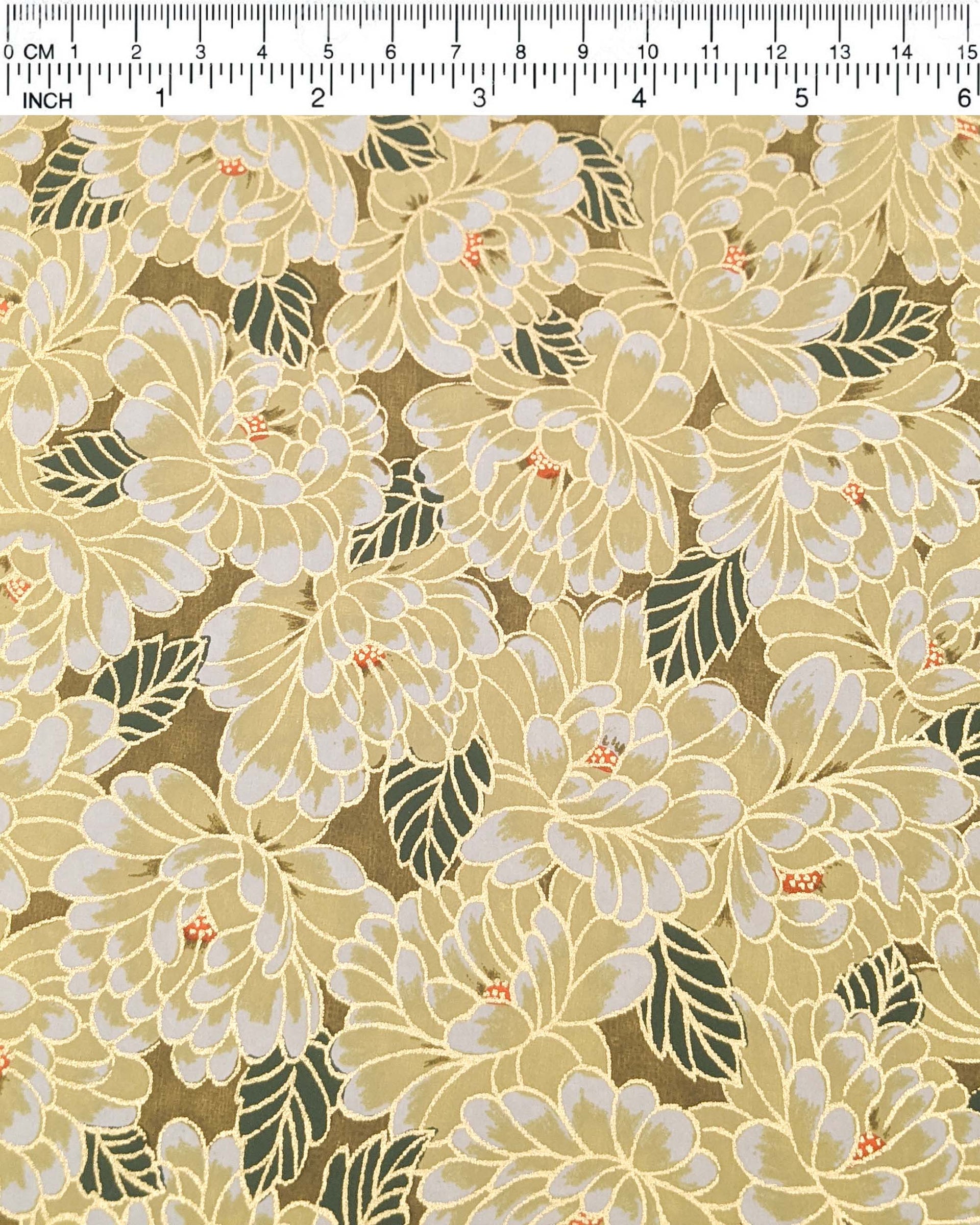 Japanese chiyogami paper featuring large yellow chrysanthemums with green leaves on a brown background with metallic gold details.