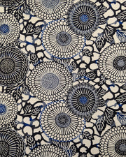 Japanese chiyogami paper featuring large black and gray zinnia flowers with small blue details on a cream background.