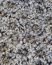 Japanese chiyogami paper featuring large black and gray chrysanthemums on a black background with metallic gold details.