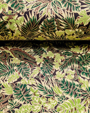 Japanese chiyogami paper featuring green and brown frond leaves on a black background with metallic gold details.