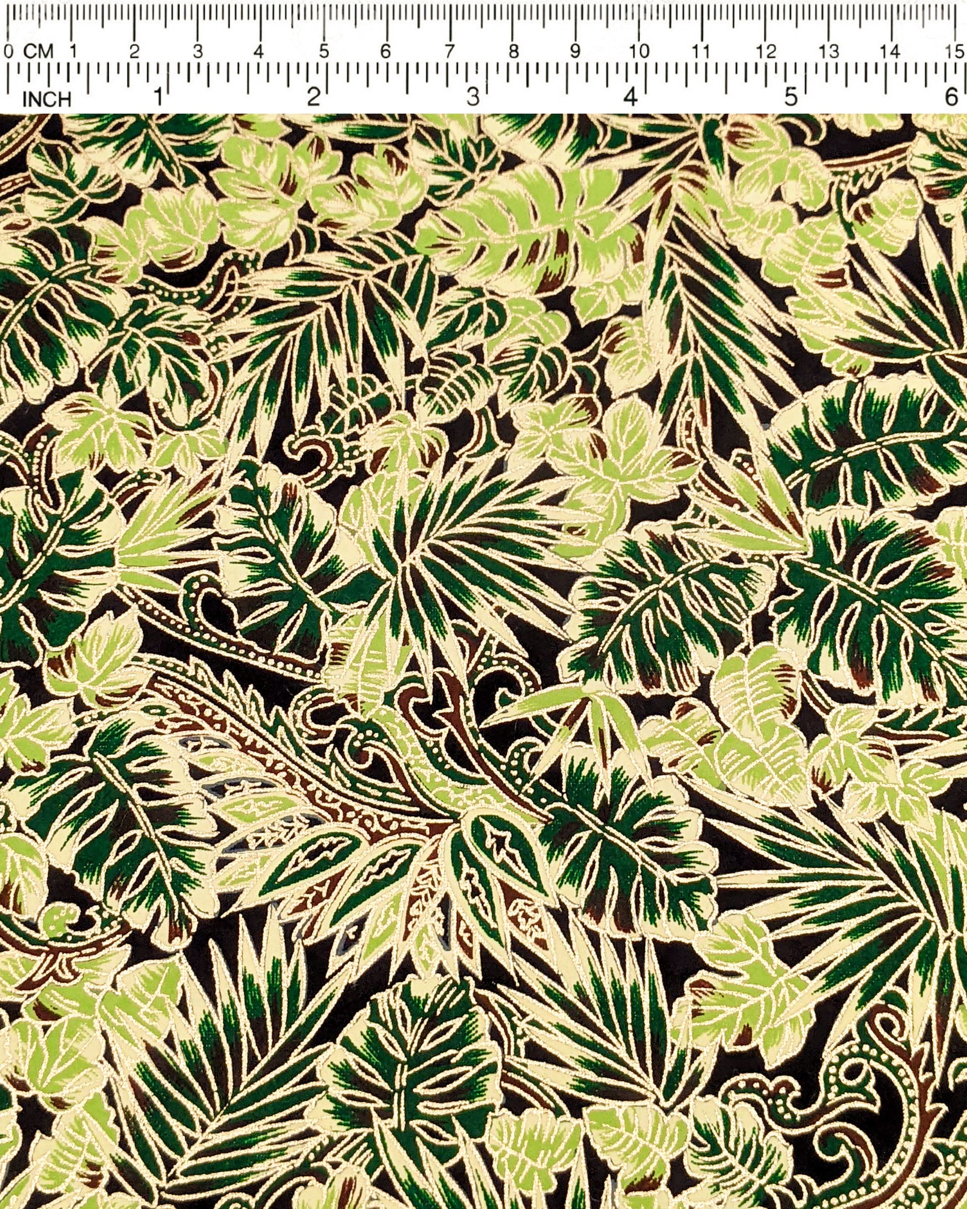 Japanese chiyogami paper featuring green and brown frond leaves on a black background with metallic gold details.