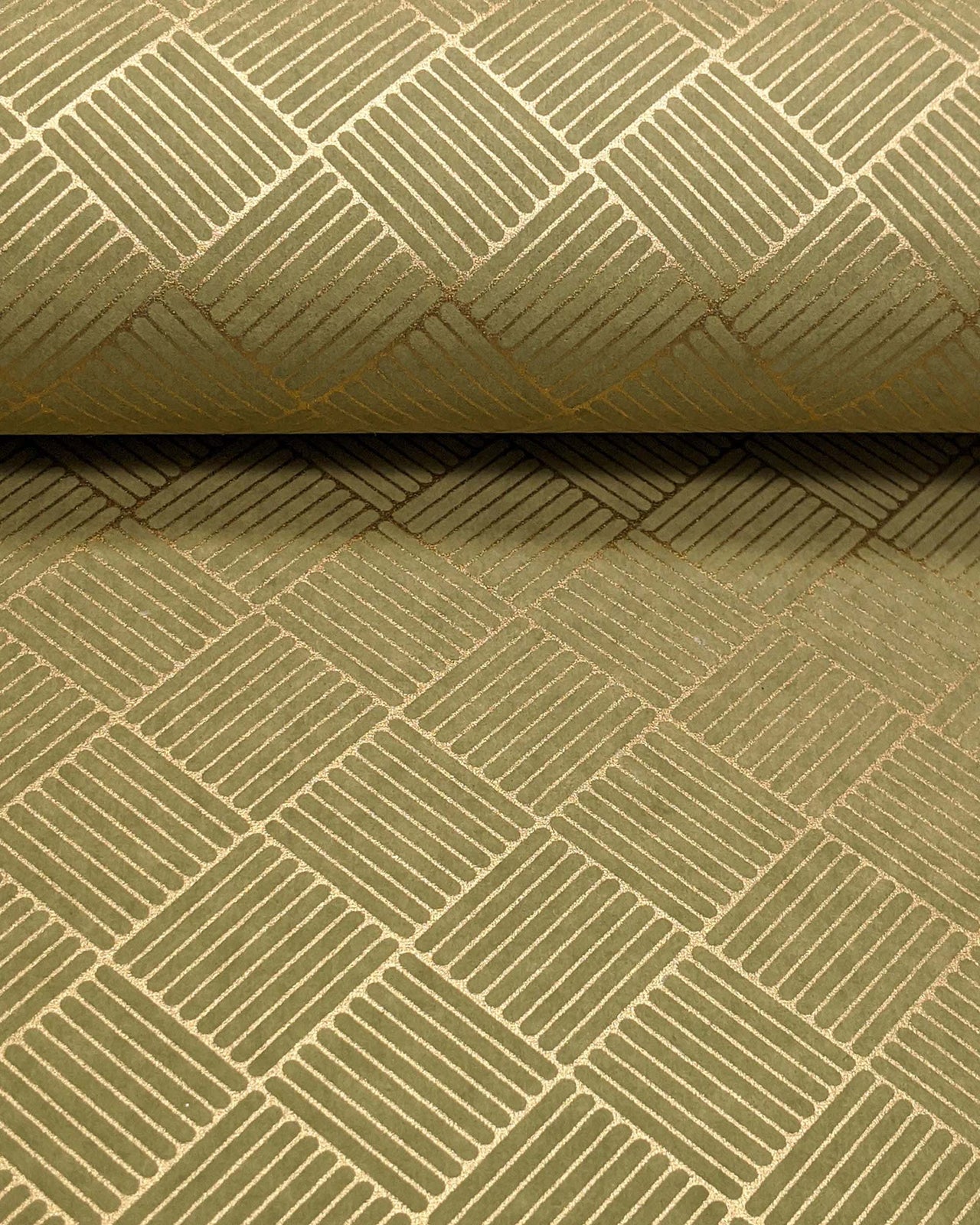 Japanese chiyogami paper featuring a metallic gold traditional san kuzushi (crosshatch) design on a light green background.