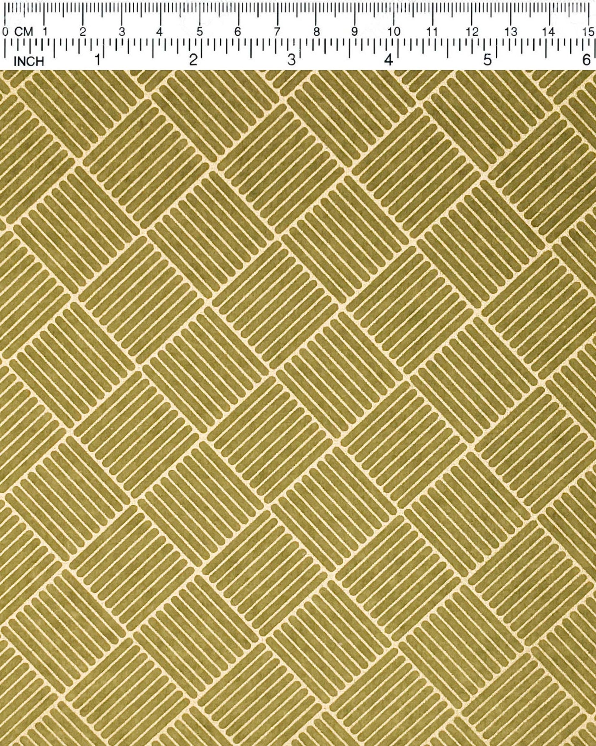 Japanese chiyogami paper featuring a metallic gold traditional san kuzushi (crosshatch) design on a light green background.