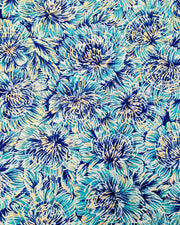 Japanese chiyogami paper featuring large blue chrysanthemums on a dark blue background with metallic gold details.