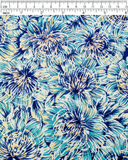 Japanese chiyogami paper featuring large blue chrysanthemums on a dark blue background with metallic gold details.