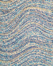 Japanese chiyogami paper featuring metallic gold and dark blue swirls on a light blue and white speckled background.