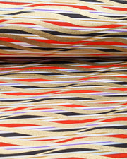 Japanese chiyogami paper featuring metallic gold swirls o a red, white, and black striped background.