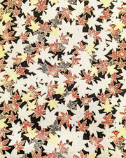 Japanese chiyogami paper featuring red, black, gold, and silver maples leaves on a black background with metallic gold details.