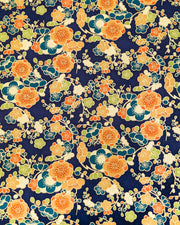 Japanese chiyogami paper featuring orange, blue, green, and cream plum blossoms on a dark blue background with metallic gold details.