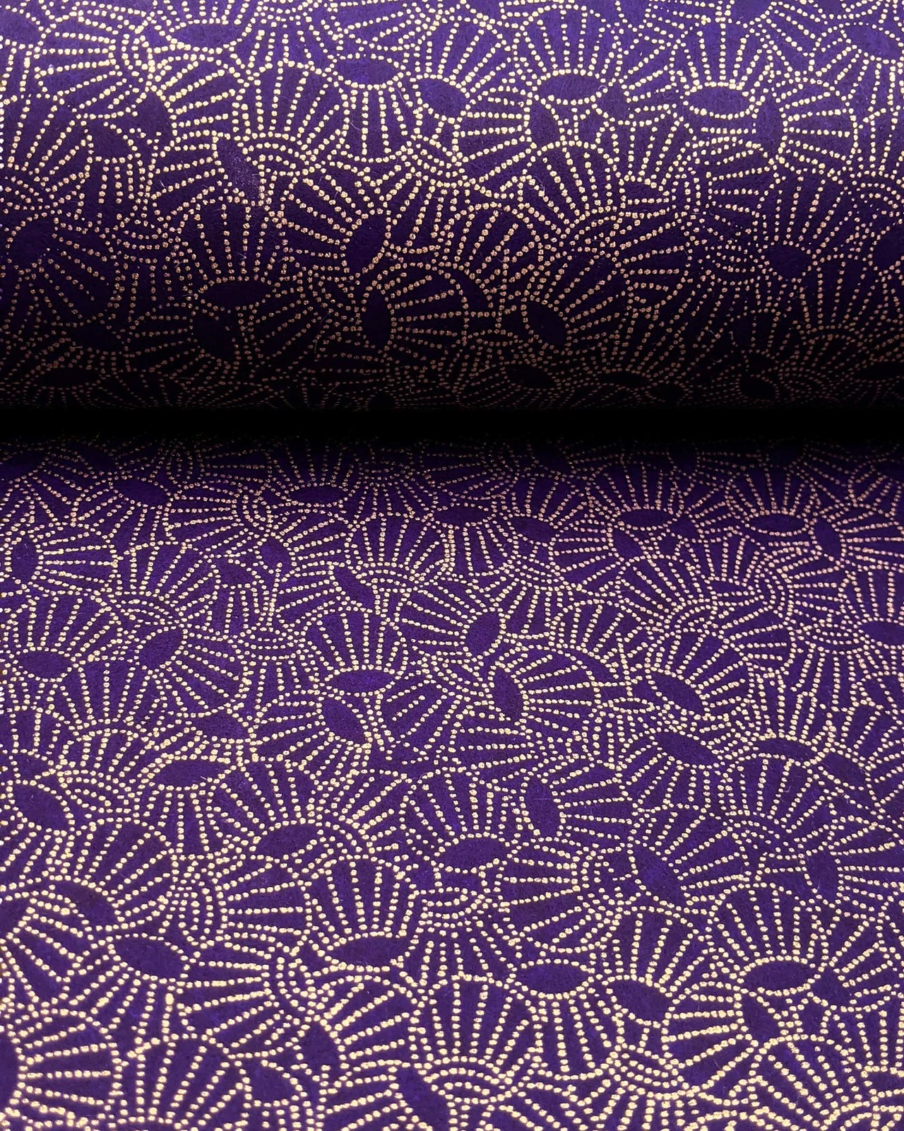 Japanese chiyogami paper featuring metallic gold dotted temari balls on a purple background.