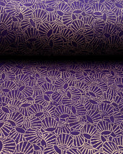 Japanese chiyogami paper featuring metallic gold dotted temari balls on a purple background.