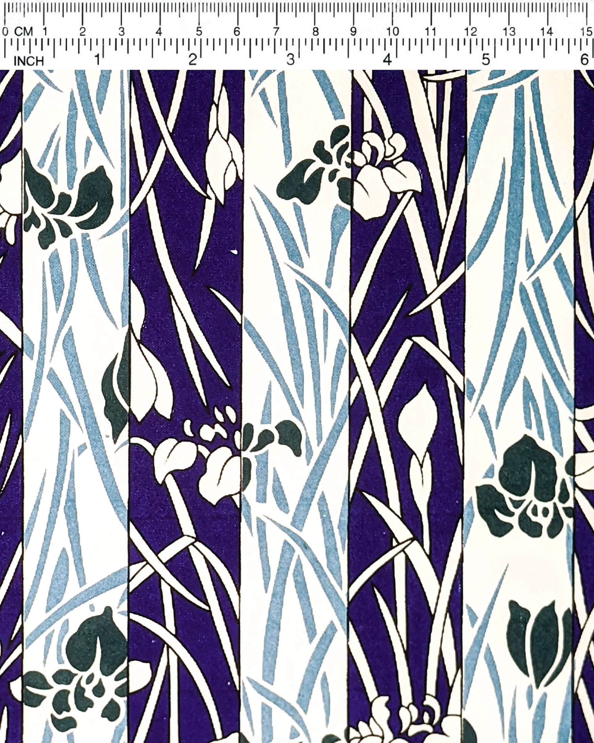 Japanese chiyogami paper featuring alternating columns of dark blue and white flowers.