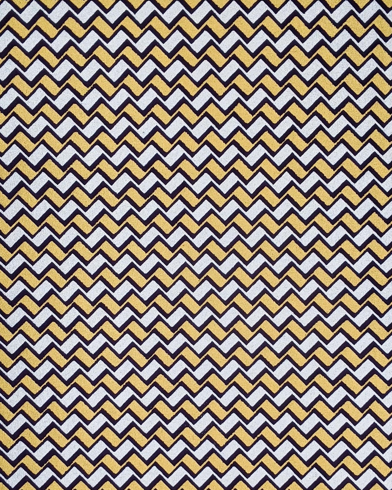 Japanese chiyogami paper featuring a navy blue, metallic silver, and metallic gold zigzag chevron pattern.
