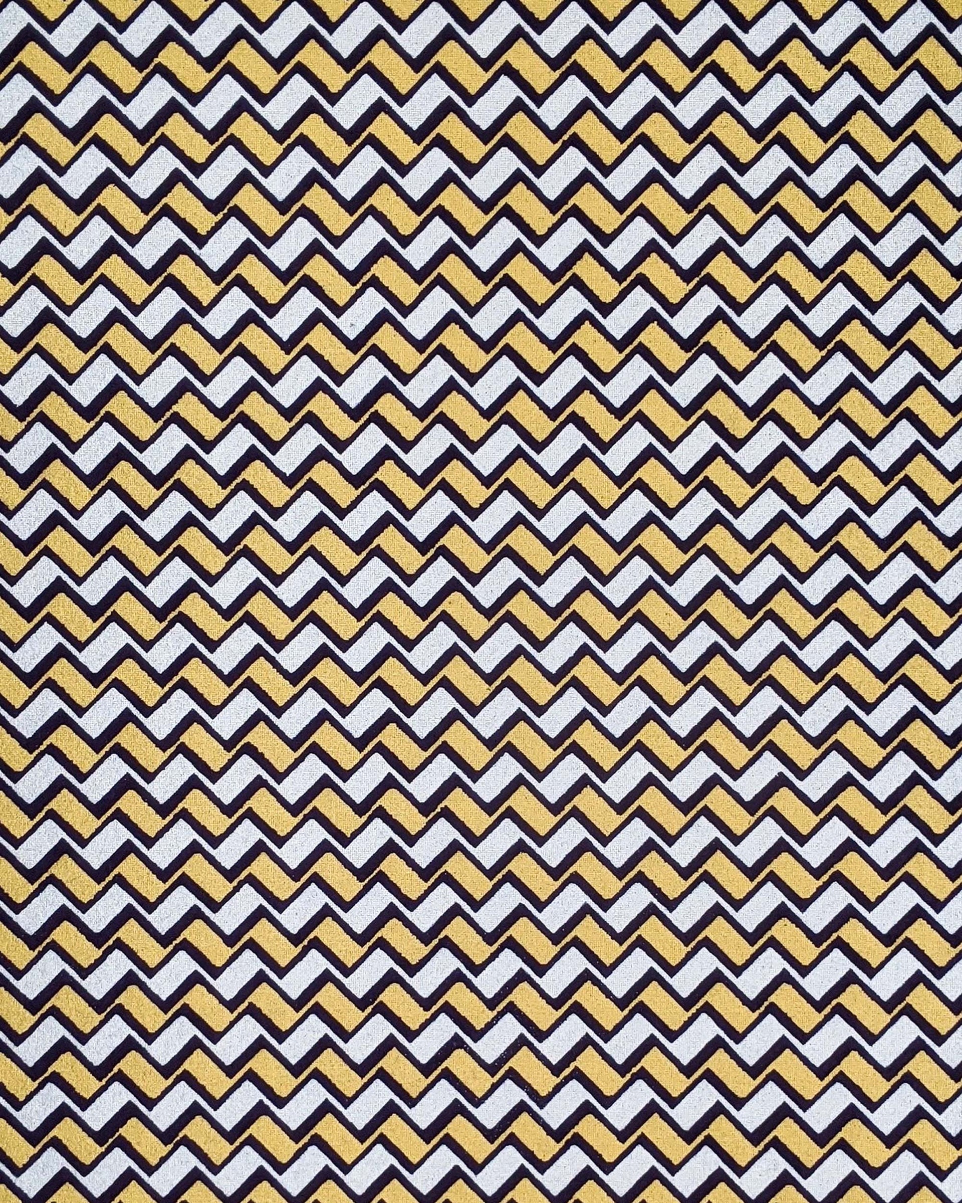 Japanese chiyogami paper featuring a navy blue, metallic silver, and metallic gold zigzag chevron pattern.