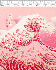 Japanese chiyogami paper featuring a pink version of the famous painting "The Great Wave Off Kanagawa" by Katsushika Hokusai with metallic gold details.