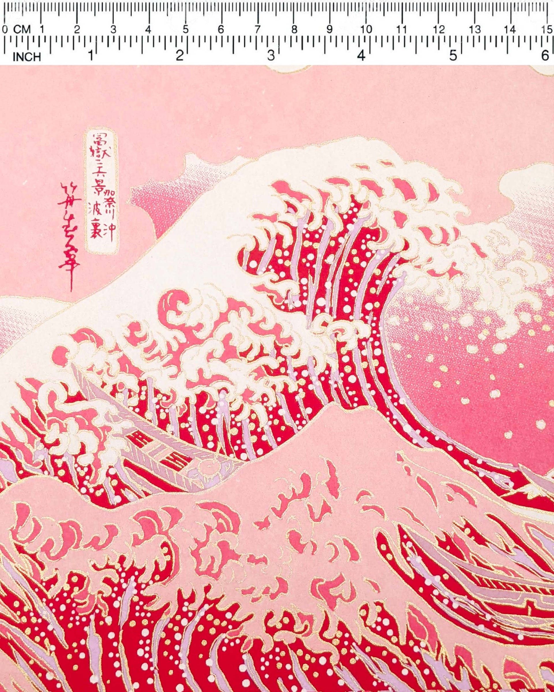 Japanese chiyogami paper featuring a pink version of the famous painting "The Great Wave Off Kanagawa" by Katsushika Hokusai with metallic gold details.
