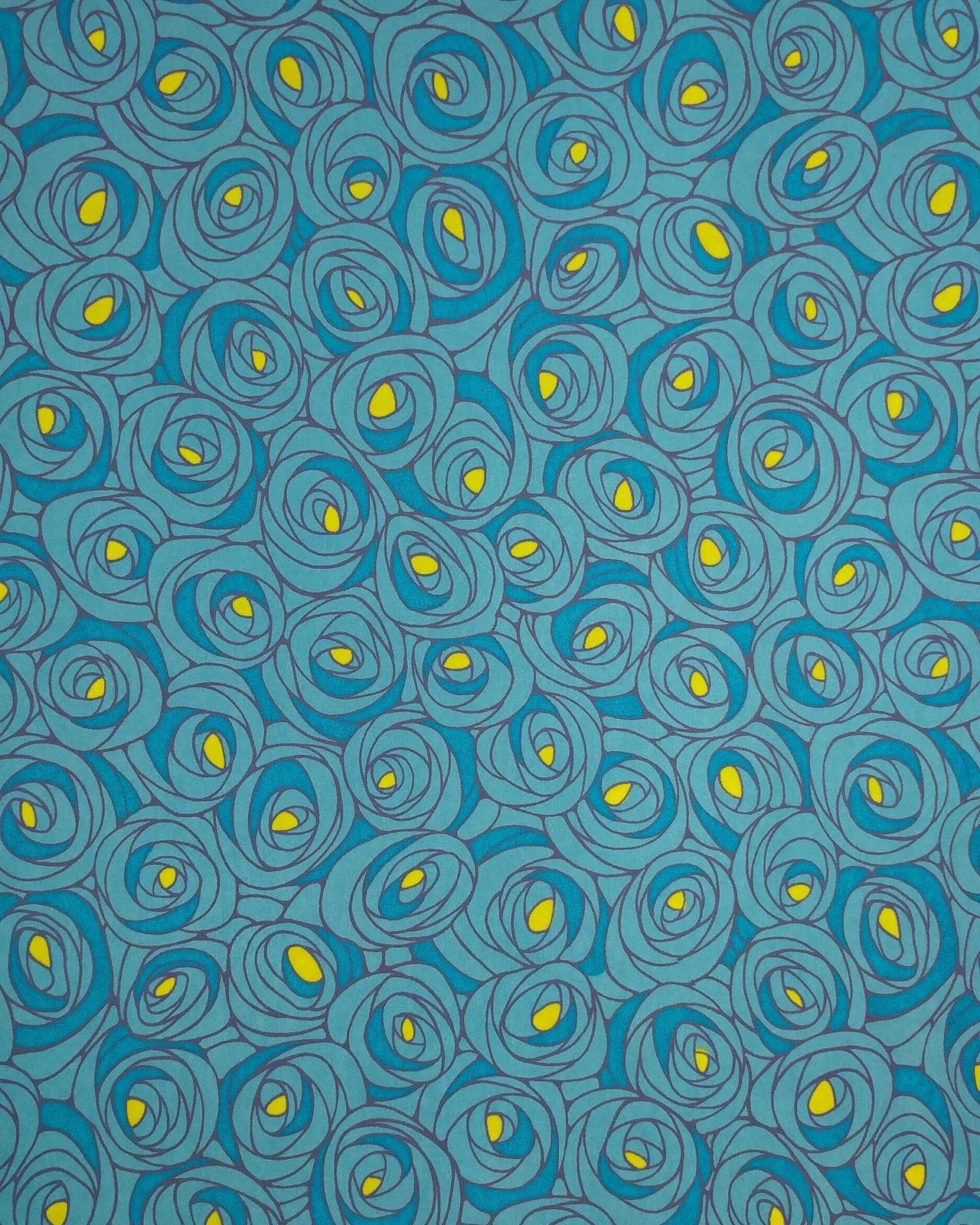 Japanese chiyogami paper featuring large blue rose buds with a yellow center. 