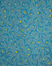 Japanese chiyogami paper featuring large blue rose buds with a yellow center. 