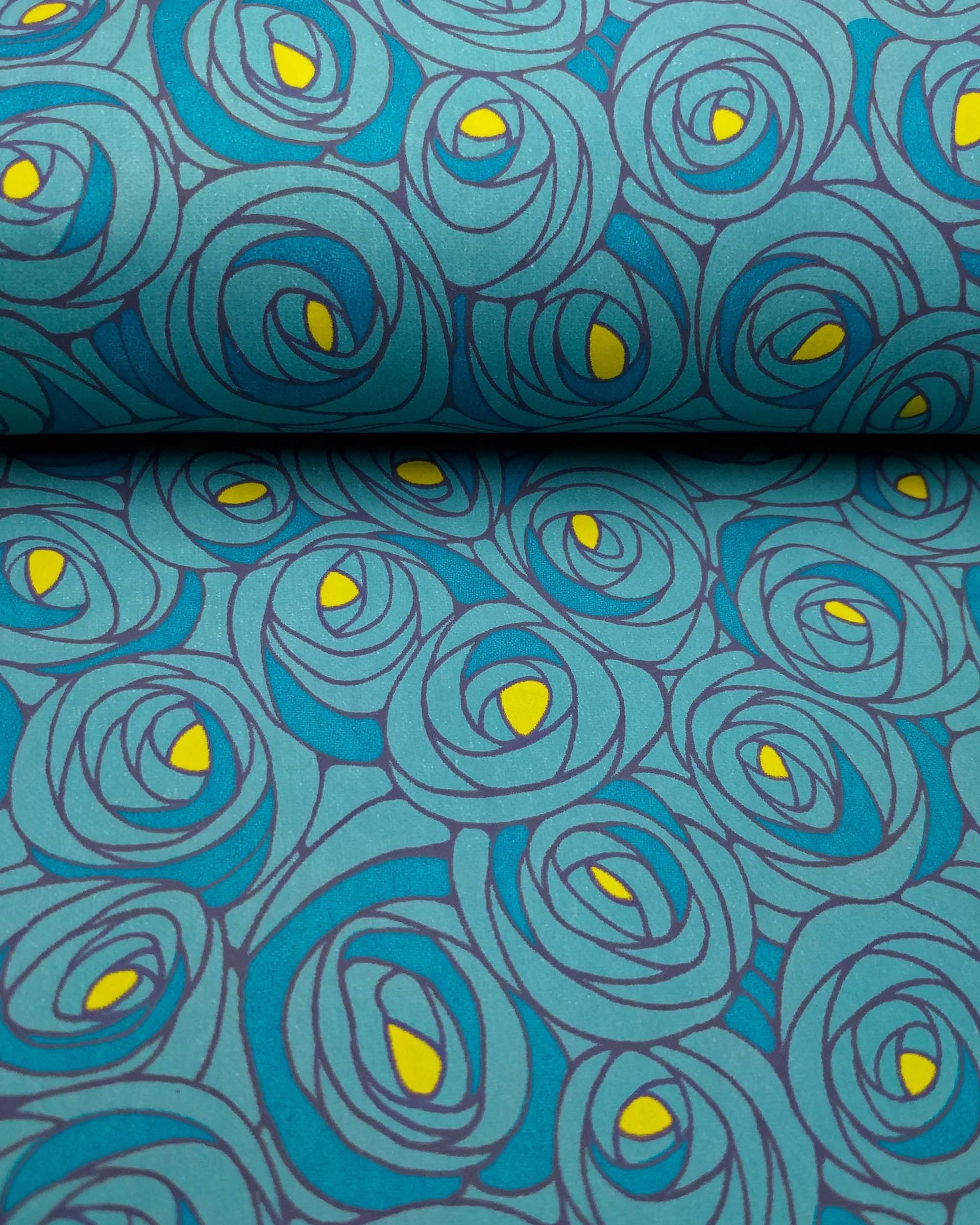 Japanese chiyogami paper featuring large blue rose buds with a yellow center. 
