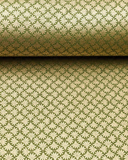 Japanese chiyogami paper featuring metallic gold geometric stylized flowers on a green background.