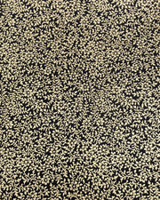 Japanese chiyogami paper featuring a metallic gold floral motif on a black background.