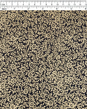 Japanese chiyogami paper featuring a metallic gold floral motif on a black background.