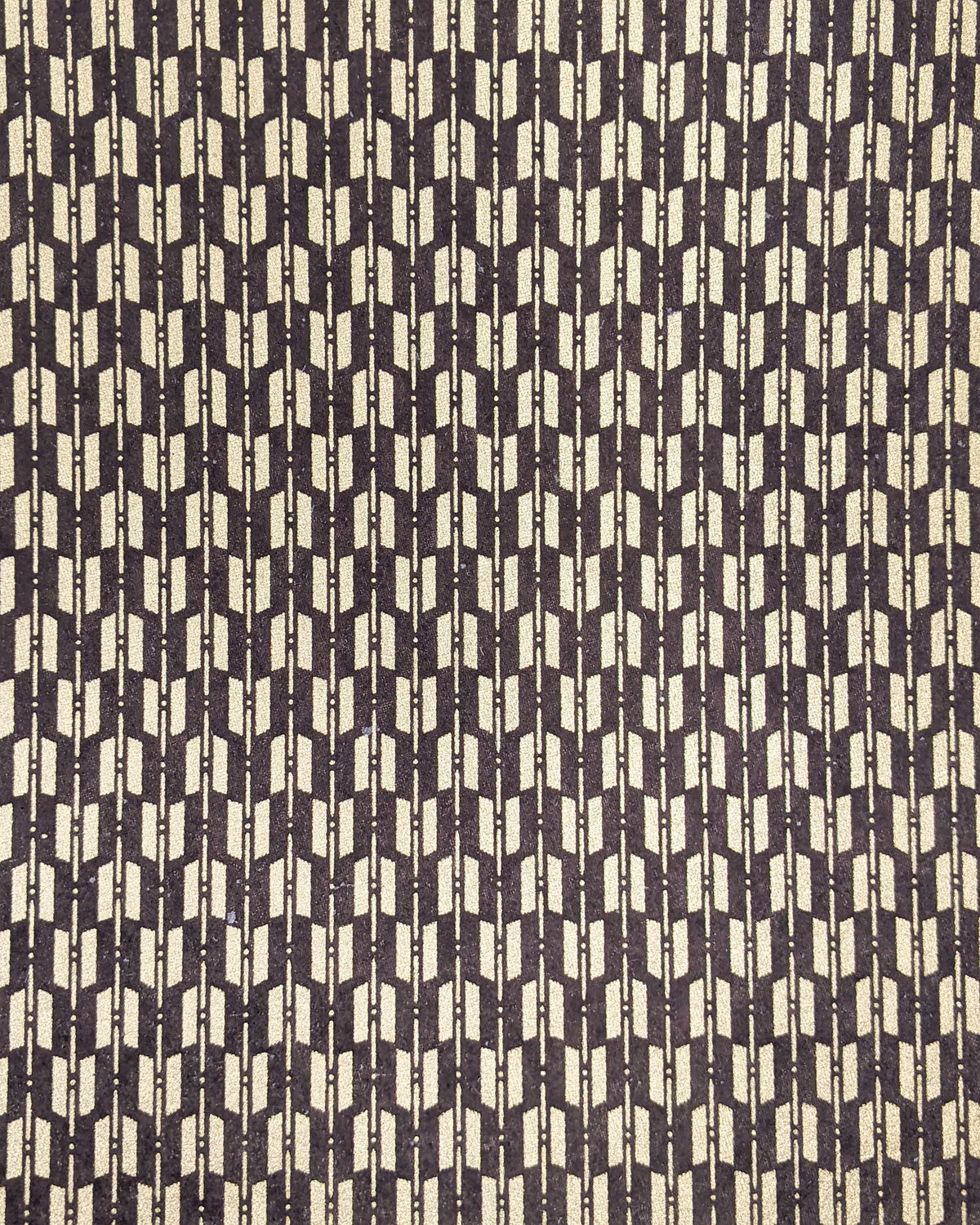 Japanese chiyogami paper featuringa traditional metallic gold yagasuri (arrow fletching) pattern on a gray background. 
