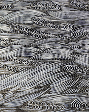 Japanese chiyogami paper featuring flowing metallic silver ripples with metallic gold dotted details on a black background.