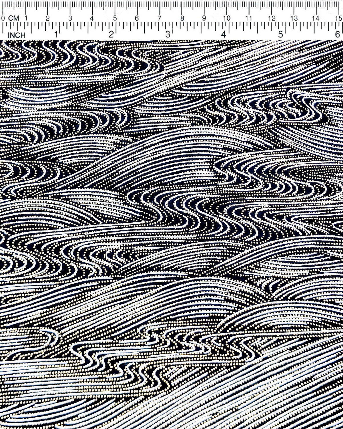 Japanese chiyogami paper featuring flowing metallic silver ripples with metallic gold dotted details on a black background, shown next to a ruler for size reference.