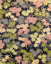 Japanese chiyogami paper featuring assorted green, pink, beige, and gray maple leaves with dark gray and metallic gold dotted maple leaves on a dark gray background.