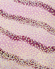 Japanese chiyogami paper featuring small white and metallic gold cherry blossoms on a gradient purple background.
