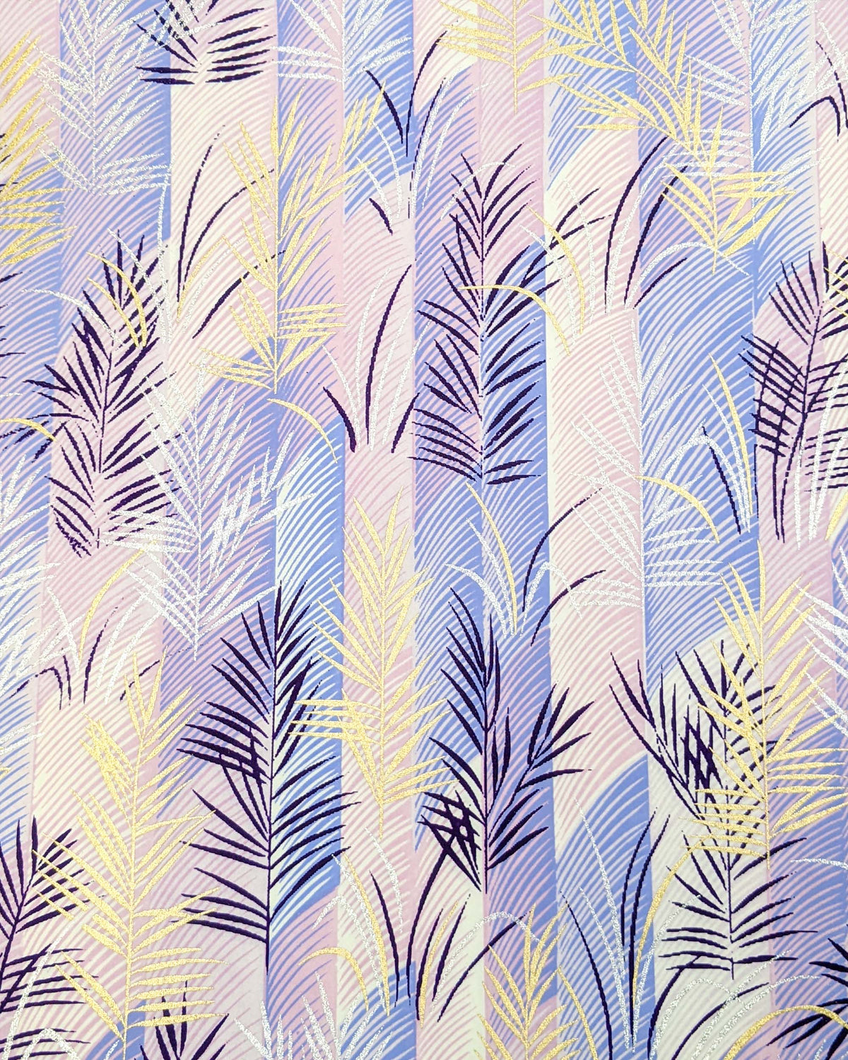 Japanese chiyogami paper featuring metallic gold, silver, and dark purple leaves on a vertically striped light purple background.